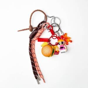 NEW BAGGLY CHARMS women's burger girl keychain bag charms in pink brown